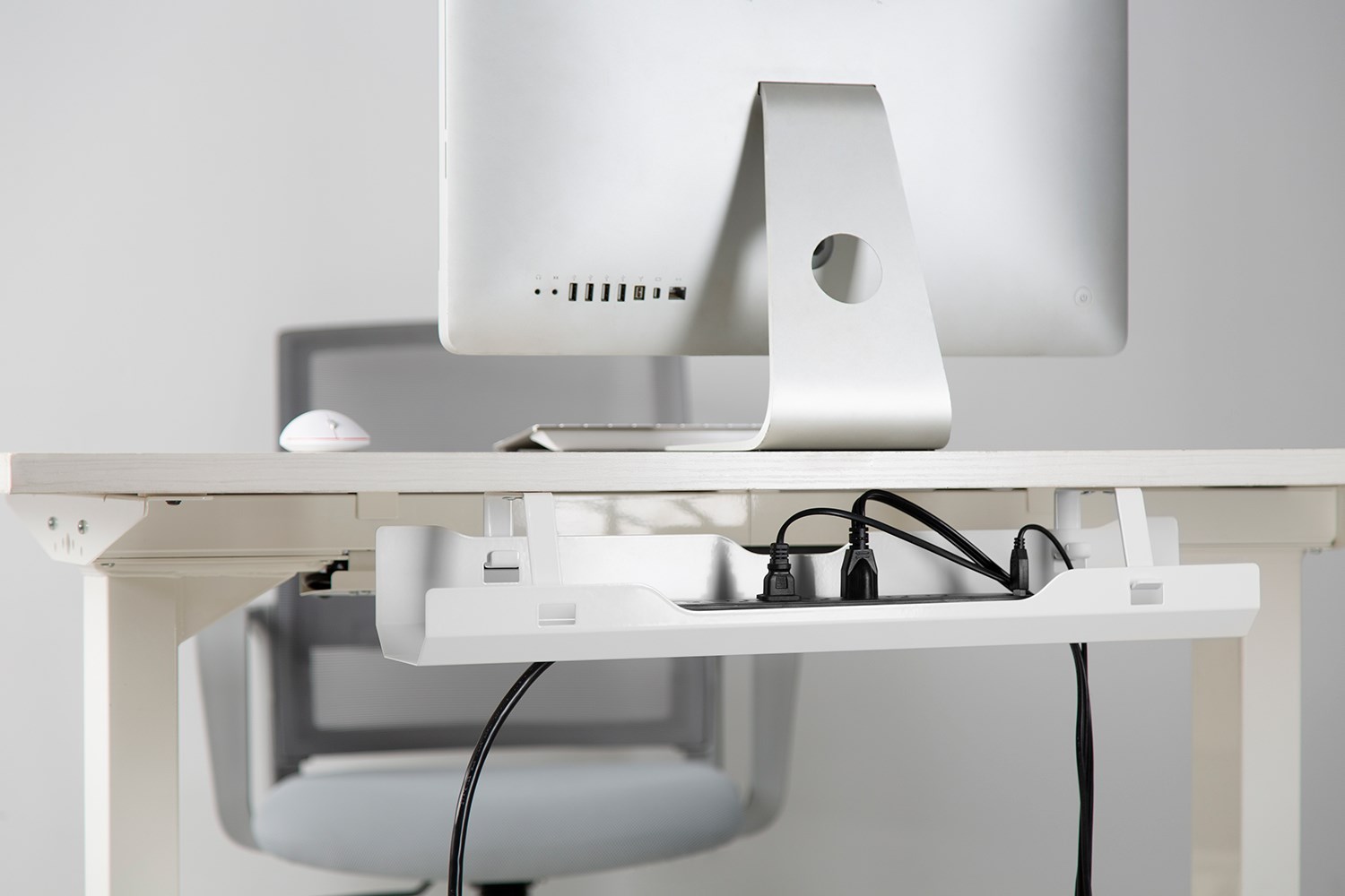 Desk cable outlet management